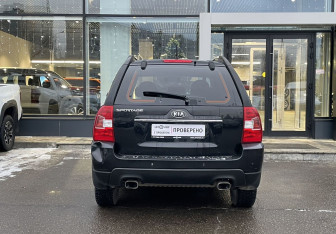Подержанный автомобиль Kia Sportage 2009 года (6 фото)