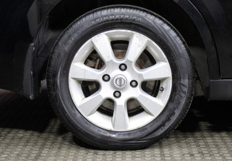 Подержанный автомобиль Nissan Tiida Sedan 2010 года (18 фото)