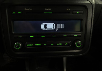 Подержанный автомобиль Skoda Fabia Hatchback 2013 года (15 фото)