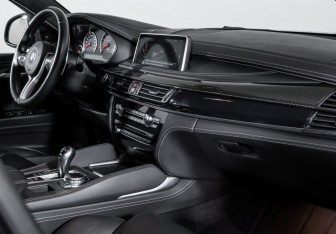 Подержанный автомобиль BMW X6 M 2015 года (9 фото)