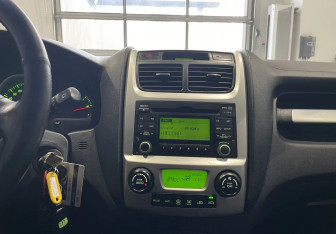 Подержанный автомобиль Kia Sportage 2010 года (16 фото)