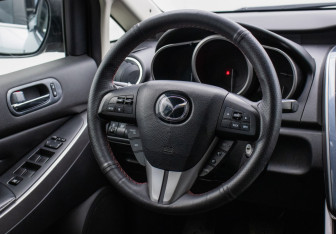 Подержанный автомобиль Mazda CX-7 2011 года (15 фото)