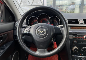 Подержанный автомобиль Mazda 3 Hatchback 2005 года (13 фото)