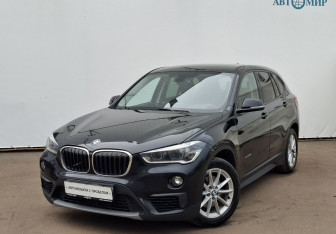 Подержанный автомобиль BMW X1 2015 года (1 фото)