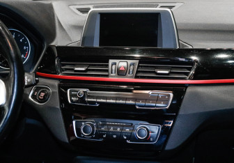 Подержанный автомобиль BMW X1 2016 года (10 фото)