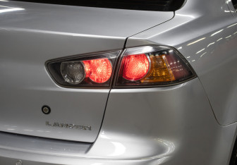 Подержанный автомобиль Mitsubishi Lancer Sedan 2011 года (23 фото)