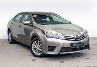 Подержанный автомобиль Toyota Corolla Sedan 2014 года (3 фото)