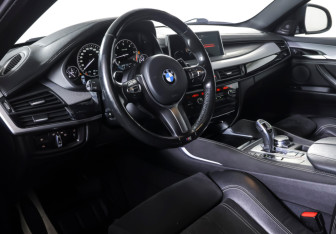 Подержанный автомобиль BMW X6 2016 года (14 фото)