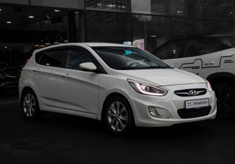 Подержанный автомобиль Hyundai Solaris Hatchback 2013 года (3 фото)