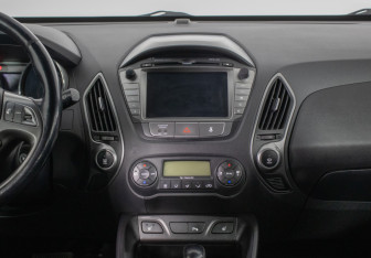 Подержанный автомобиль Hyundai ix35 2013 года (14 фото)