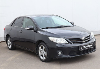 Подержанный автомобиль Toyota Corolla Sedan 2011 года (3 фото)