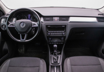 Подержанный автомобиль Skoda Rapid Liftback 2014 года (13 фото)