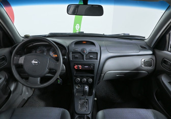 Подержанный автомобиль Nissan Almera Classic 2012 года (8 фото)