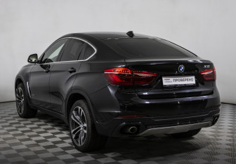 Подержанный автомобиль BMW X6 2016 года (7 фото)