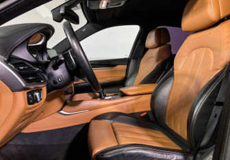 Подержанный автомобиль BMW X6 2016 года (16 фото)