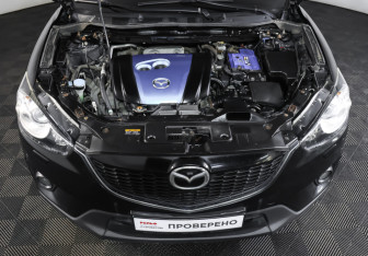 Подержанный автомобиль Mazda CX-5 2011 года (9 фото)