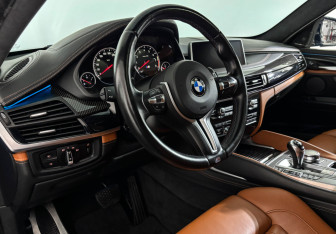 Подержанный автомобиль BMW X6 M 2016 года (12 фото)