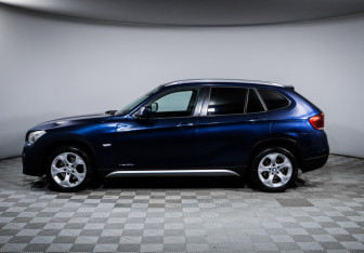 Подержанный автомобиль BMW X1 2012 года (8 фото)