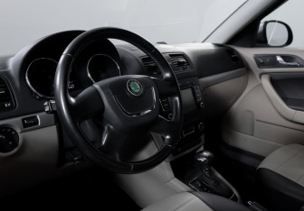Подержанный автомобиль Skoda Yeti 2011 года (14 фото)