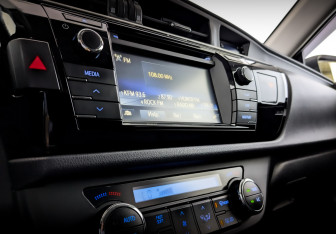 Подержанный автомобиль Toyota Corolla Sedan 2013 года (26 фото)