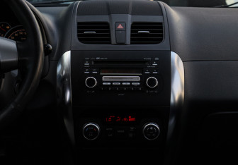 Подержанный автомобиль Suzuki SX4 Hatchback 2010 года (10 фото)
