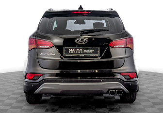 Подержанный автомобиль Hyundai Santa Fe 2015 года (6 фото)