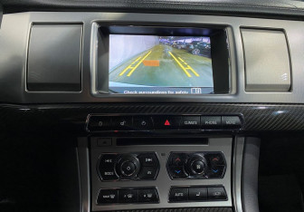 Подержанный автомобиль Jaguar XF Sedan 2014 года (14 фото)