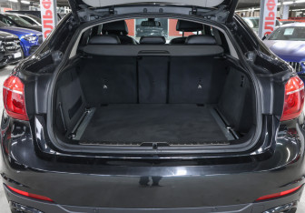 Подержанный автомобиль BMW X6 2015 года (10 фото)