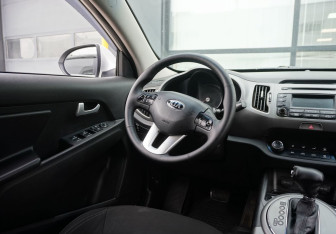 Подержанный автомобиль Kia Sportage 2015 года (13 фото)