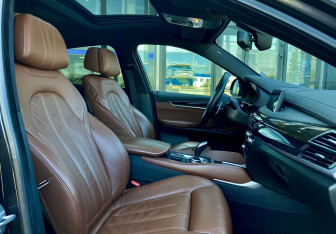 Подержанный автомобиль BMW X6 2014 года (25 фото)