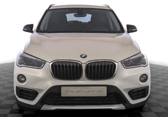Подержанный автомобиль BMW X1 2017 года (2 фото)