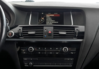 Подержанный автомобиль BMW X4 2015 года (17 фото)