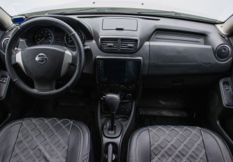 Подержанный автомобиль Nissan Terrano 2014 года (13 фото)