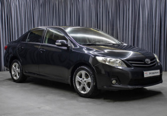 Подержанный автомобиль Toyota Corolla Sedan 2011 года (3 фото)