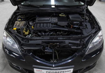 Подержанный автомобиль Mazda 3 Hatchback 2006 года (9 фото)