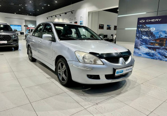 Подержанный автомобиль Mitsubishi Lancer Sedan 2004 года (3 фото)