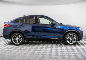 Подержанный автомобиль BMW X4 2017 года (4 фото)