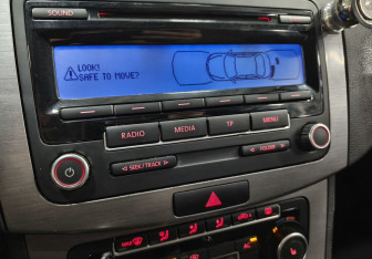 Подержанный автомобиль Volkswagen Passat Sedan 2011 года (14 фото)