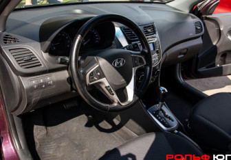 Подержанный автомобиль Hyundai Solaris Sedan 2013 года (14 фото)