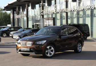Подержанный автомобиль BMW X1 2013 года (17 фото)