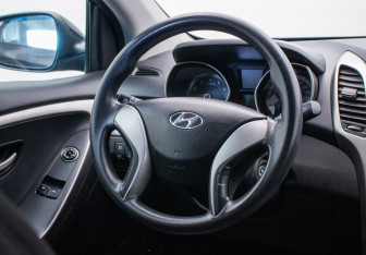 Подержанный автомобиль Hyundai i30 Hatchback 2015 года (15 фото)