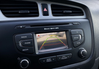 Подержанный автомобиль Kia Ceed Wagon 2014 года (15 фото)