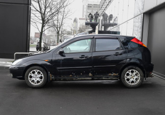 Подержанный автомобиль Ford Focus Sedan 2004 года (8 фото)