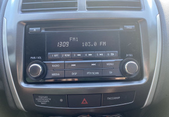 Подержанный автомобиль Mitsubishi ASX 2013 года (14 фото)