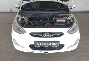 Подержанный автомобиль Hyundai Solaris Sedan 2013 года (18 фото)