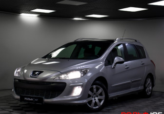 Подержанный автомобиль Peugeot 308 Wagon 2010 года (23 фото)