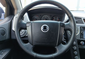 Подержанный автомобиль SsangYong Kyron 2011 года (12 фото)