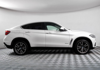 Подержанный автомобиль BMW X6 2016 года (4 фото)