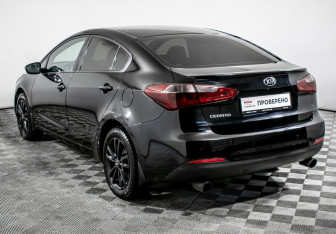 Подержанный автомобиль Kia Cerato Sedan 2014 года (7 фото)