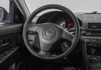 Подержанный автомобиль Mazda 3 Hatchback 2006 года (15 фото)